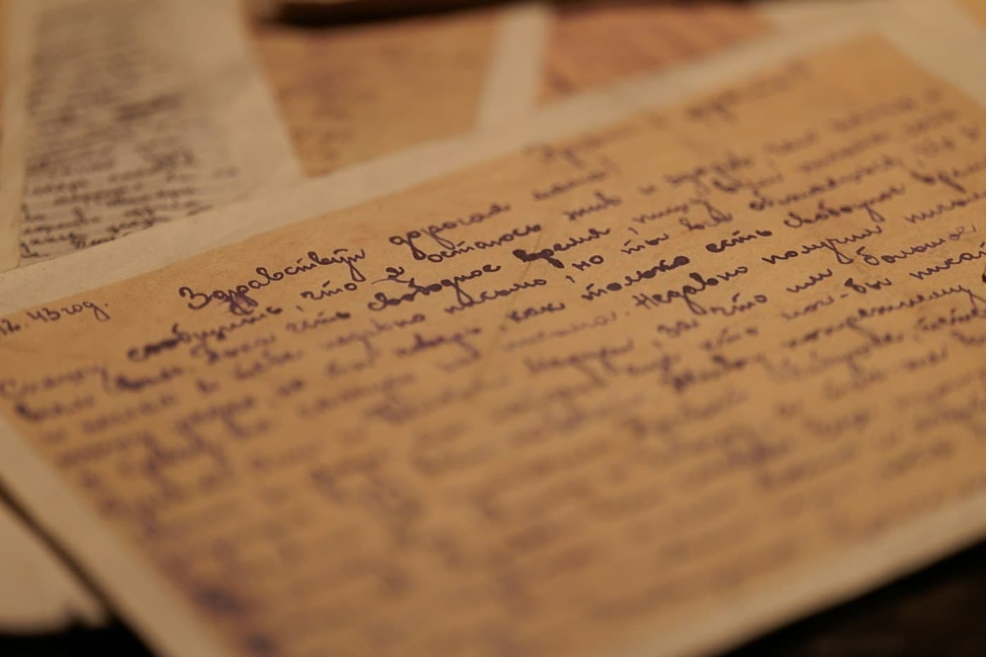 A page of handwritten notes in blue ink on aged paper
